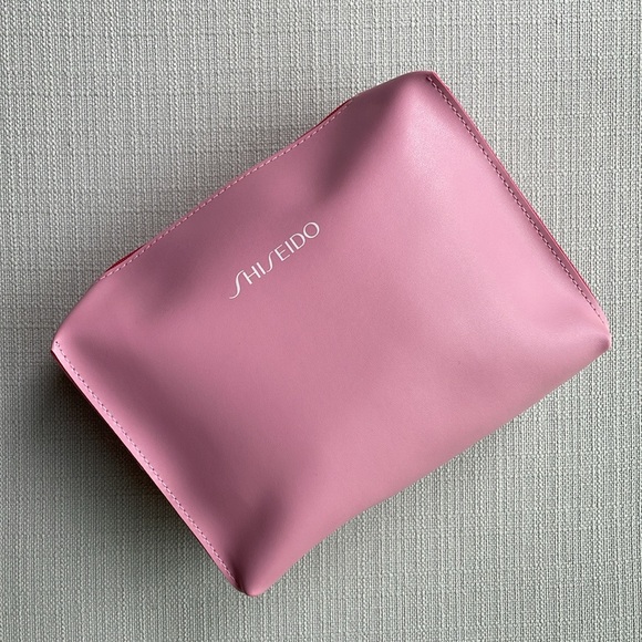 Shiseido Handbags - Shiseido pink cosmetics bag
